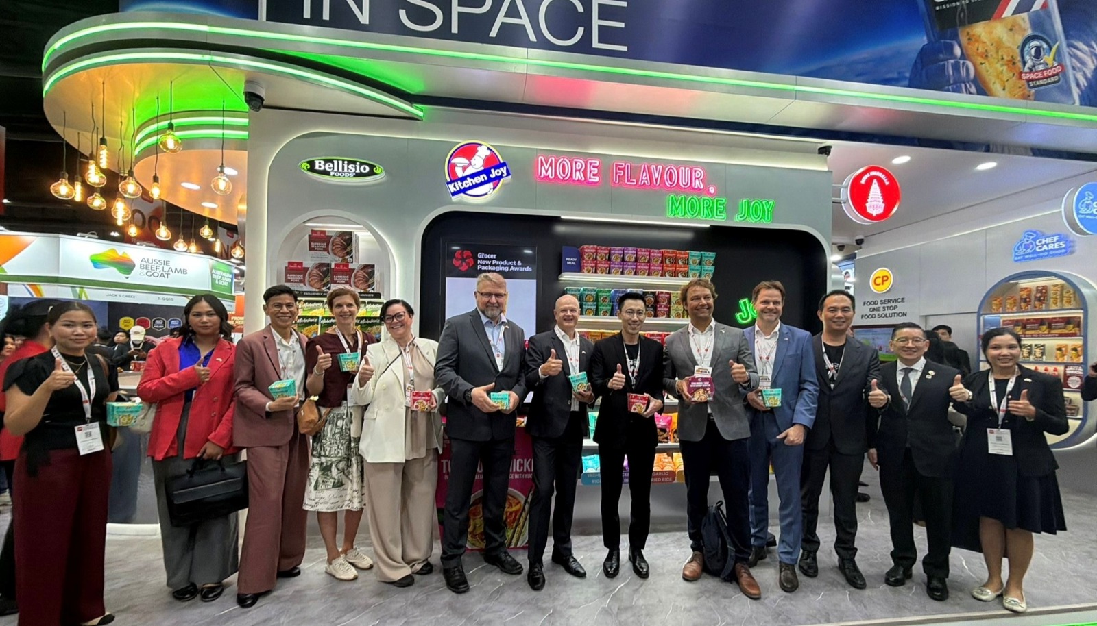 People standing in front of supermarket shelf