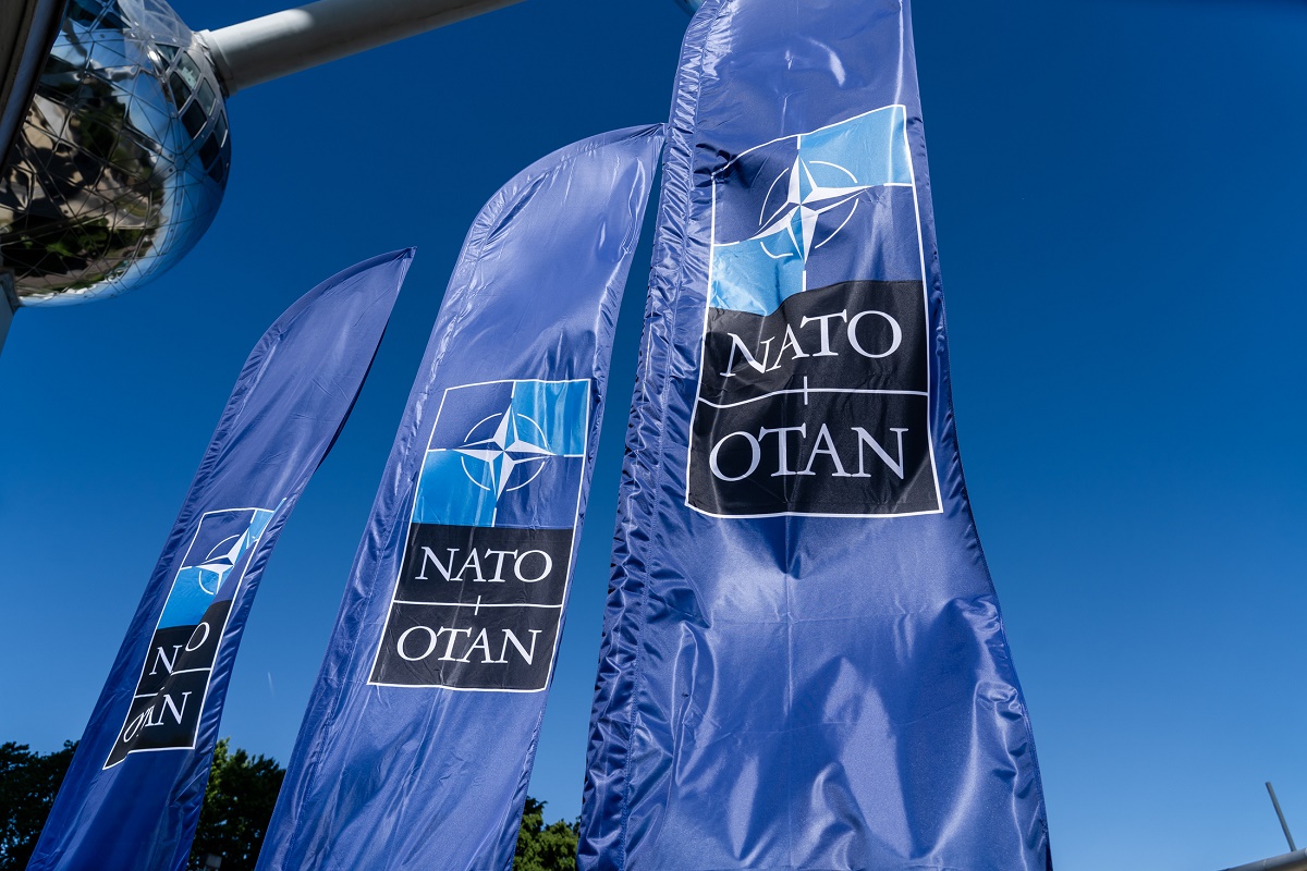 Three NATO flags