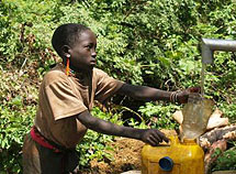 A Gumuz girl using a newly installed water point. Photo: Antti Inkinen.